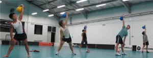 Working Out With Kettlebells: Swing, Windmill, Overhead Lunge, Getup